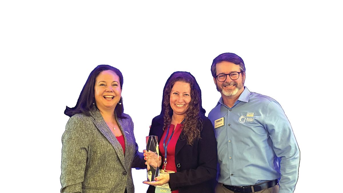 Rebekah Arthur (center), president and CEO of the Seminole County Chamber, with Michelle Oyola McGovern of Comcast and John Newstreet, president/CEO of The Osceola Chamber