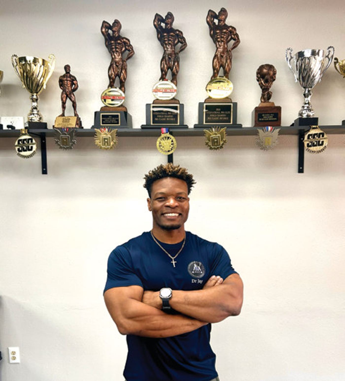 Jay with a few of his bodybuilding trophies