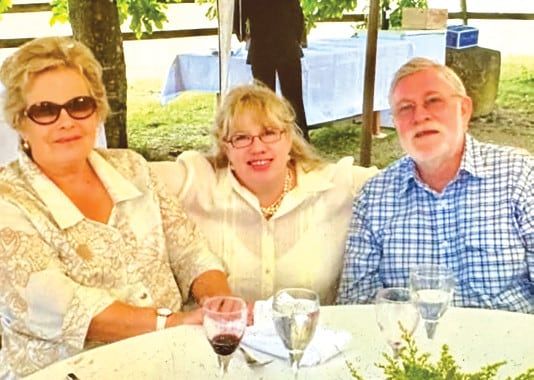 Emma Dixon with her parents Ingrid and John