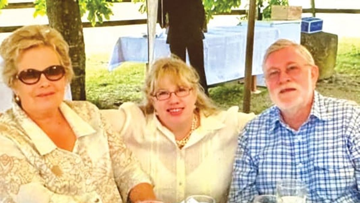 Emma Dixon with her parents Ingrid and John