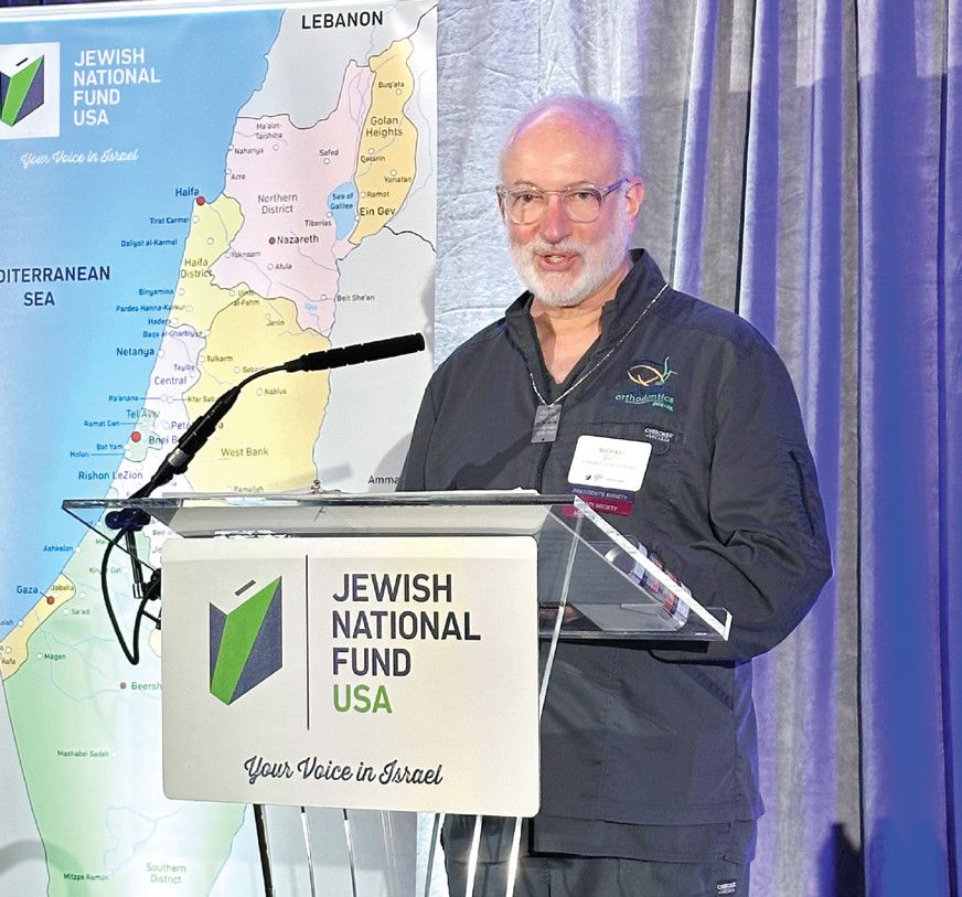 Dr. Michael Beim at a Jewish National Fund-USA podium