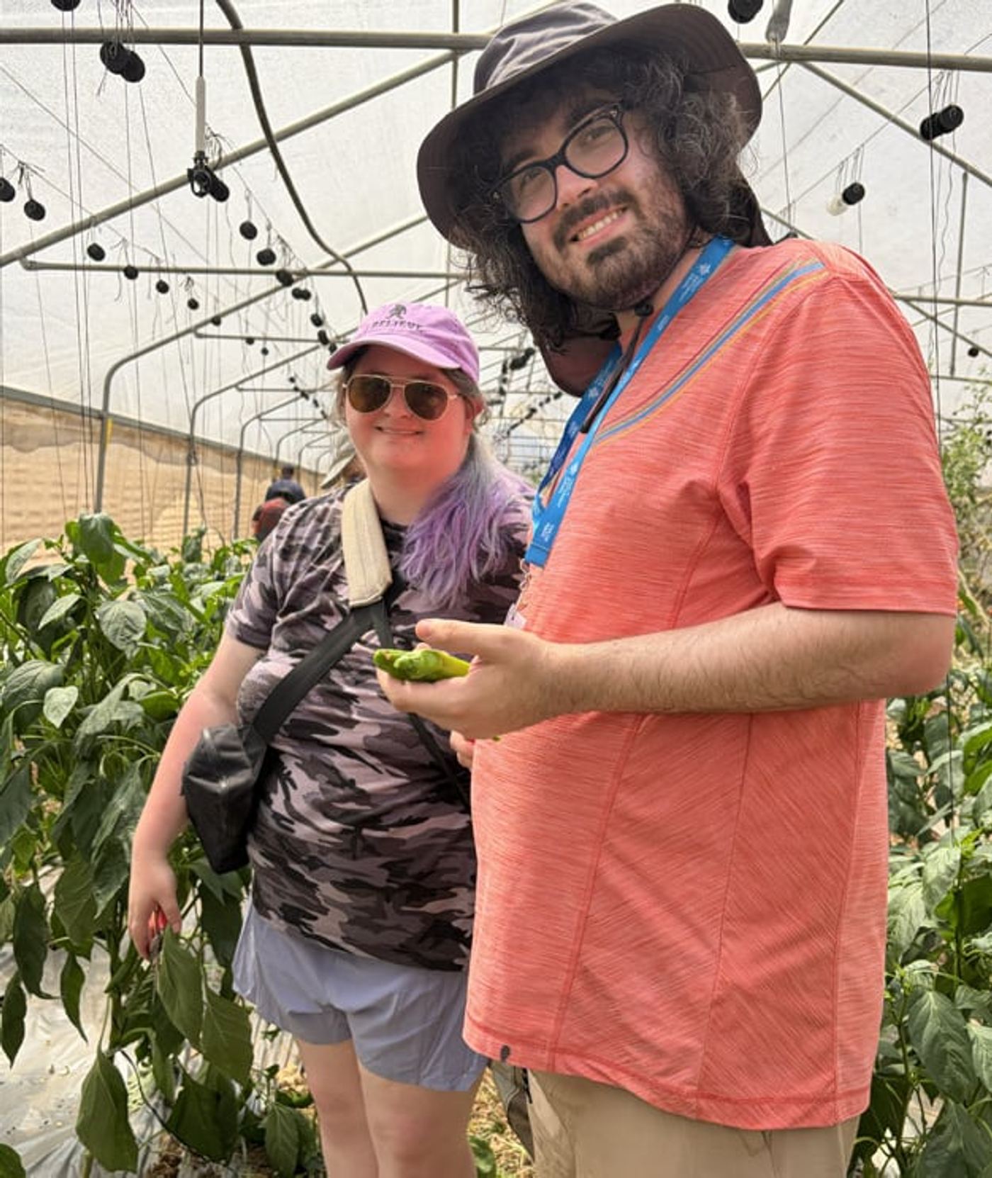 Rebecca and Evan picking peppers