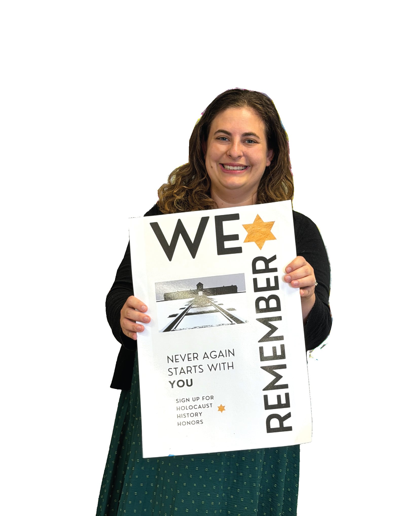 Megan Thompson holding a We Remember sign