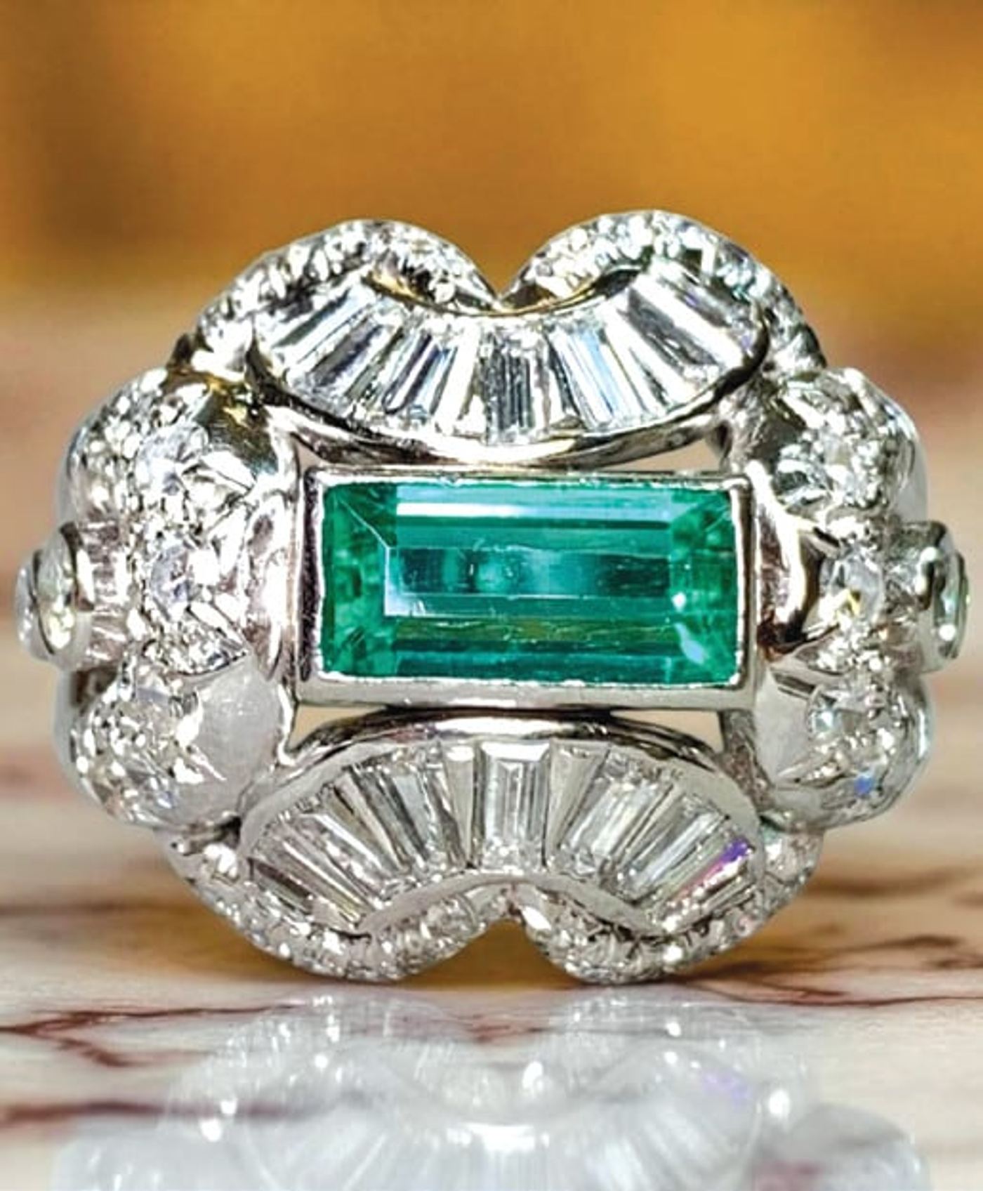 An estate ring with an emerald