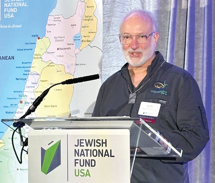Dr. Michael Beim at a Jewish National Fund-USA podium