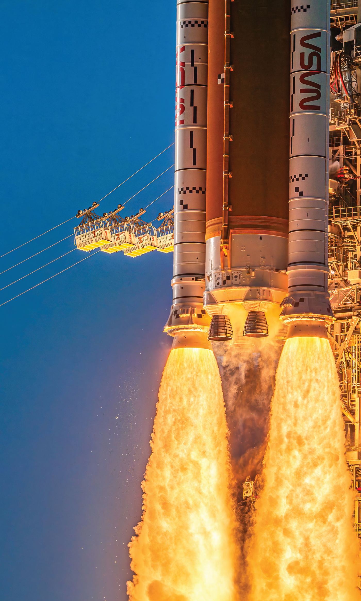 The Artemis II rocket lifting off