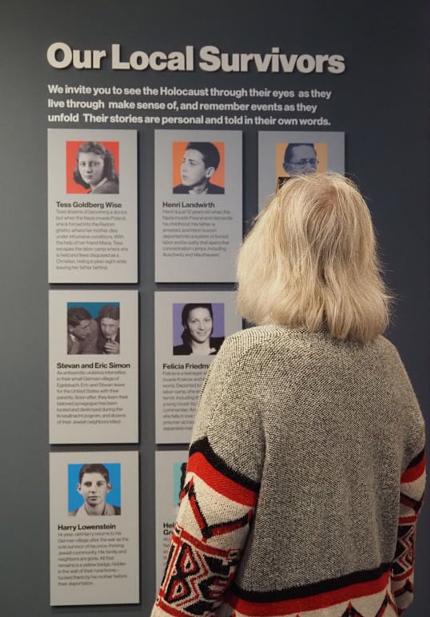 The Our Local Survivors wall at the Holocaust Center