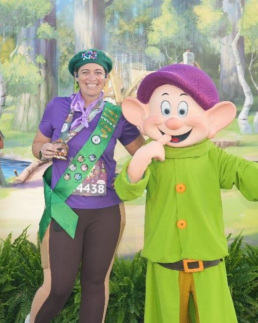 Rebecca Adams with Dopey at a runDisney race