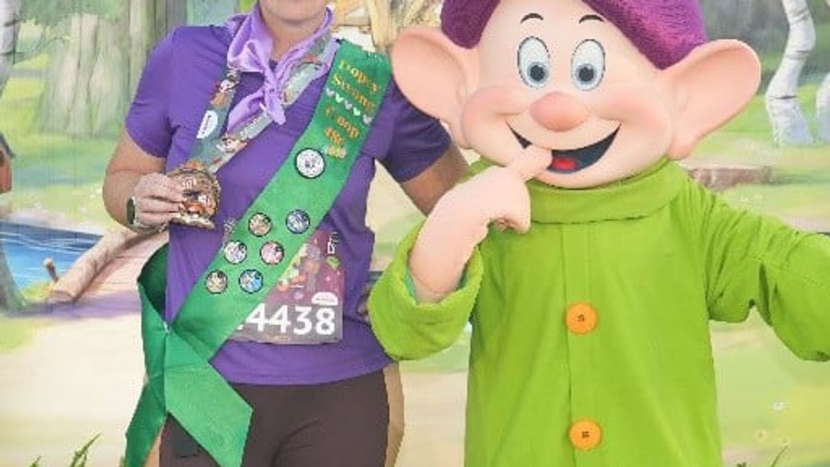 Rebecca Adams with Dopey at a runDisney race