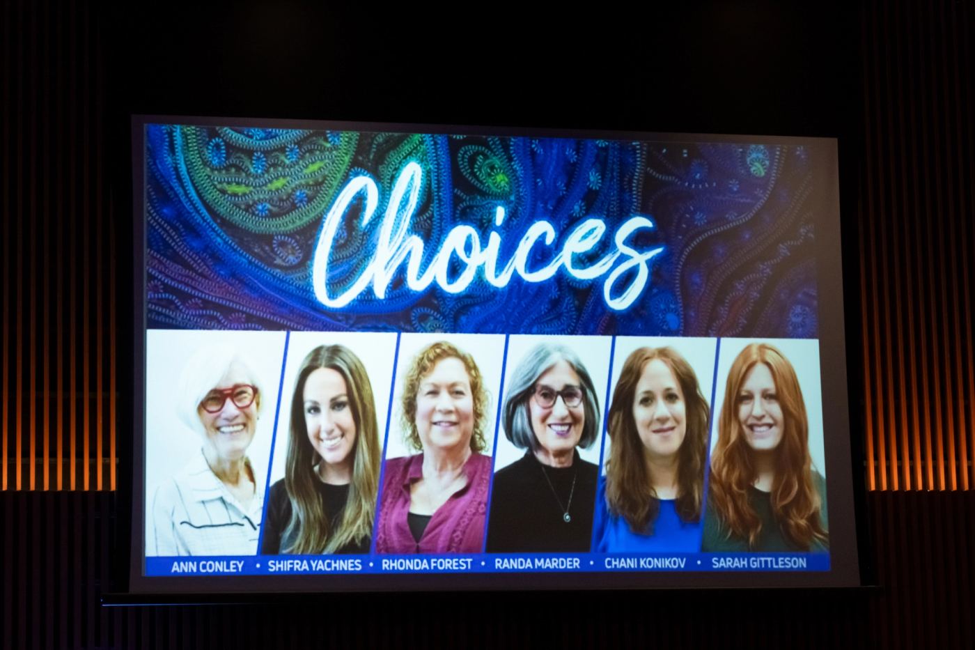 The Choices 2024 honorees shown on the screen at the event