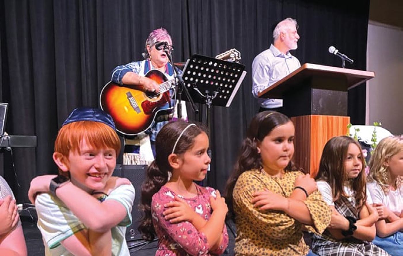 Children and musicians at a WOW Chavurah holiday service
