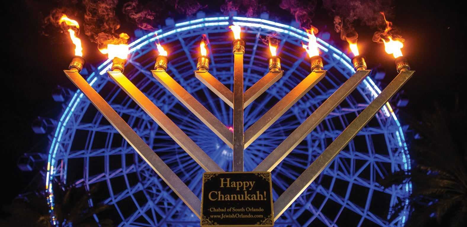 A giant lit menorah at Chabad of South Orlando’s Hanukkah festival