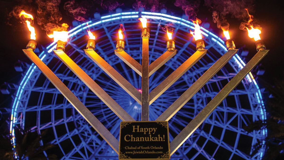 A giant lit menorah at Chabad of South Orlando’s Hanukkah festival