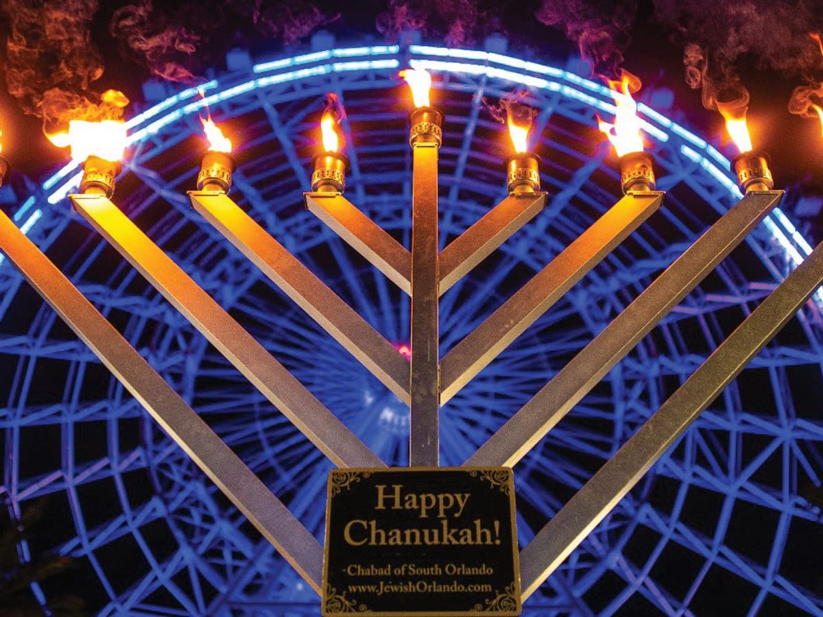 A giant lit menorah at Chabad of South Orlando’s Hanukkah festival