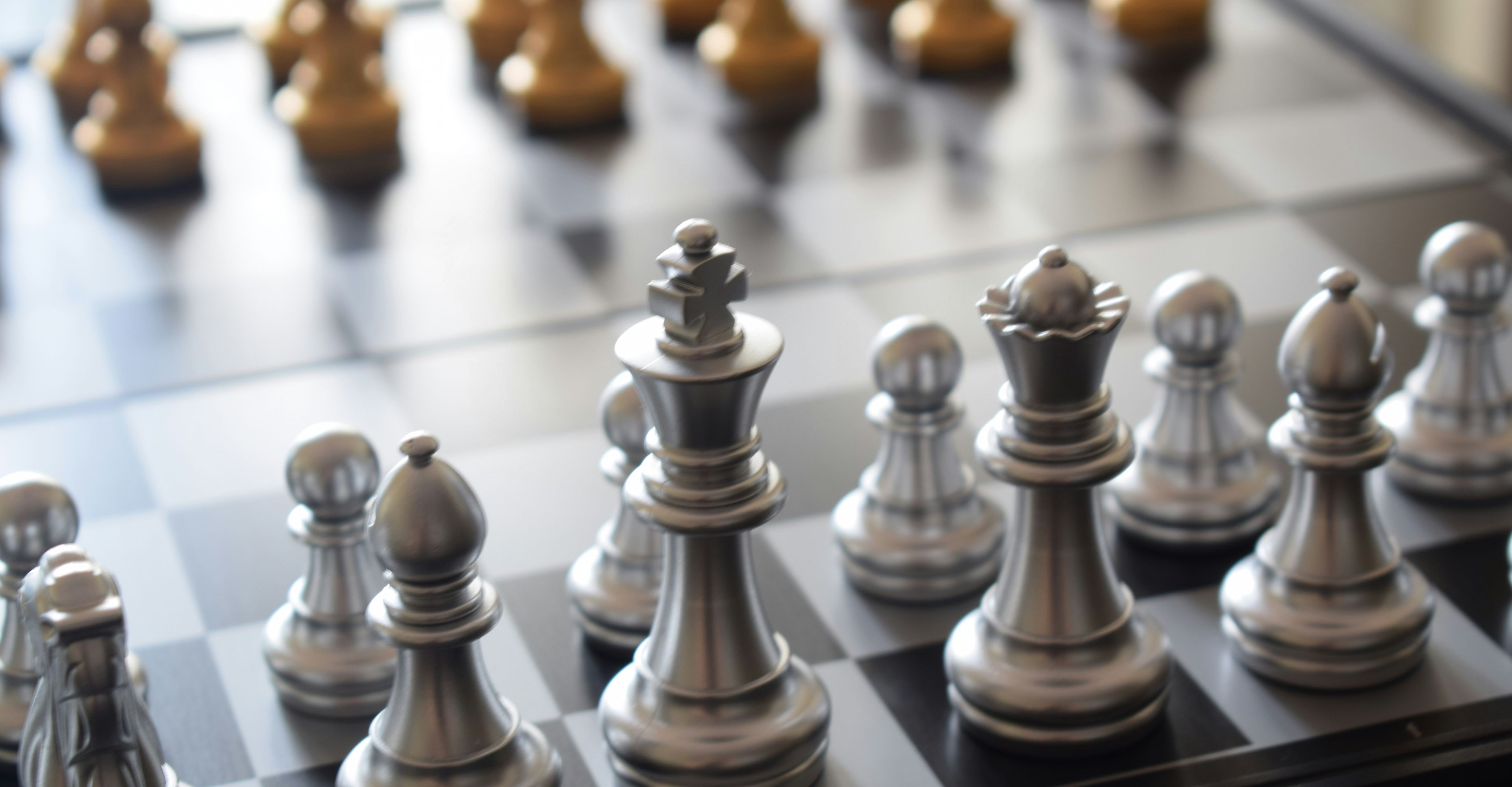 Gold and silver chess pieces