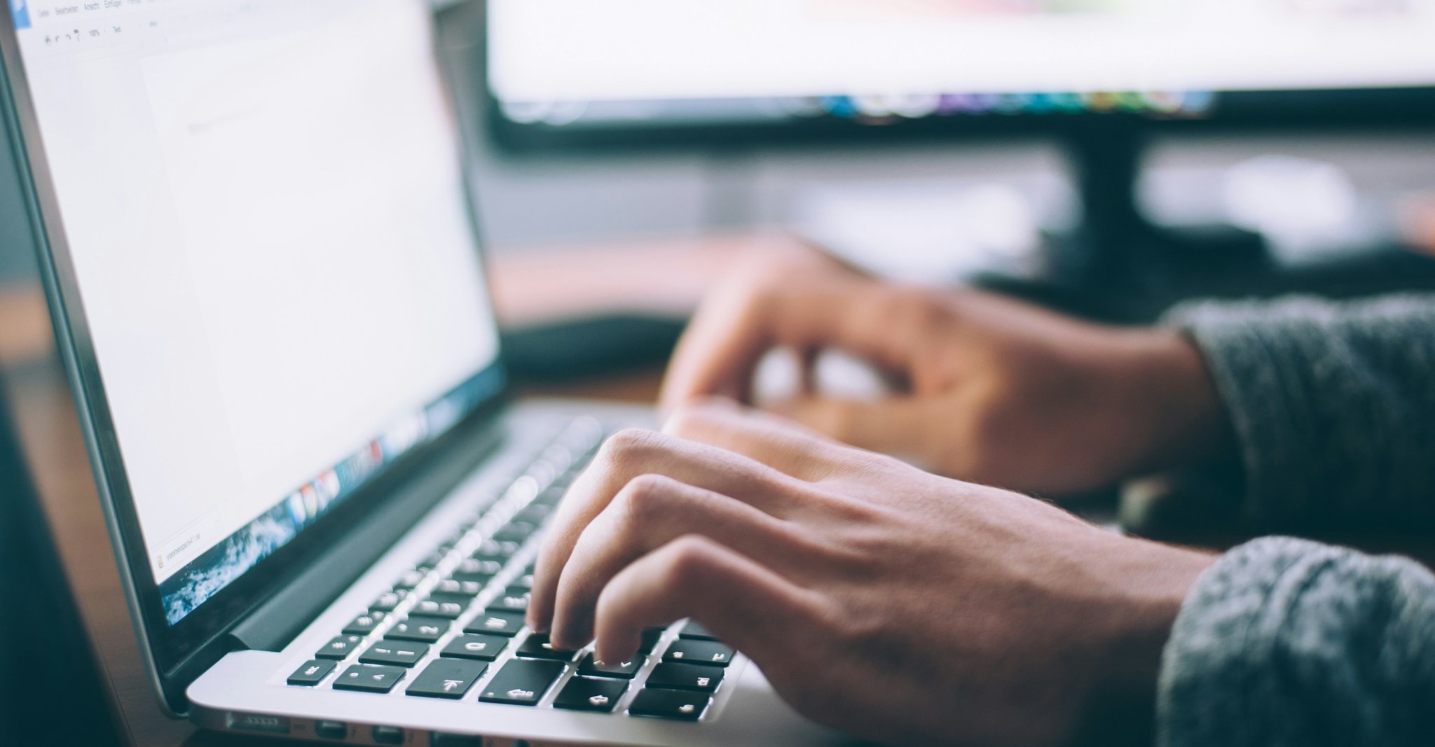 Typing on a laptop for research