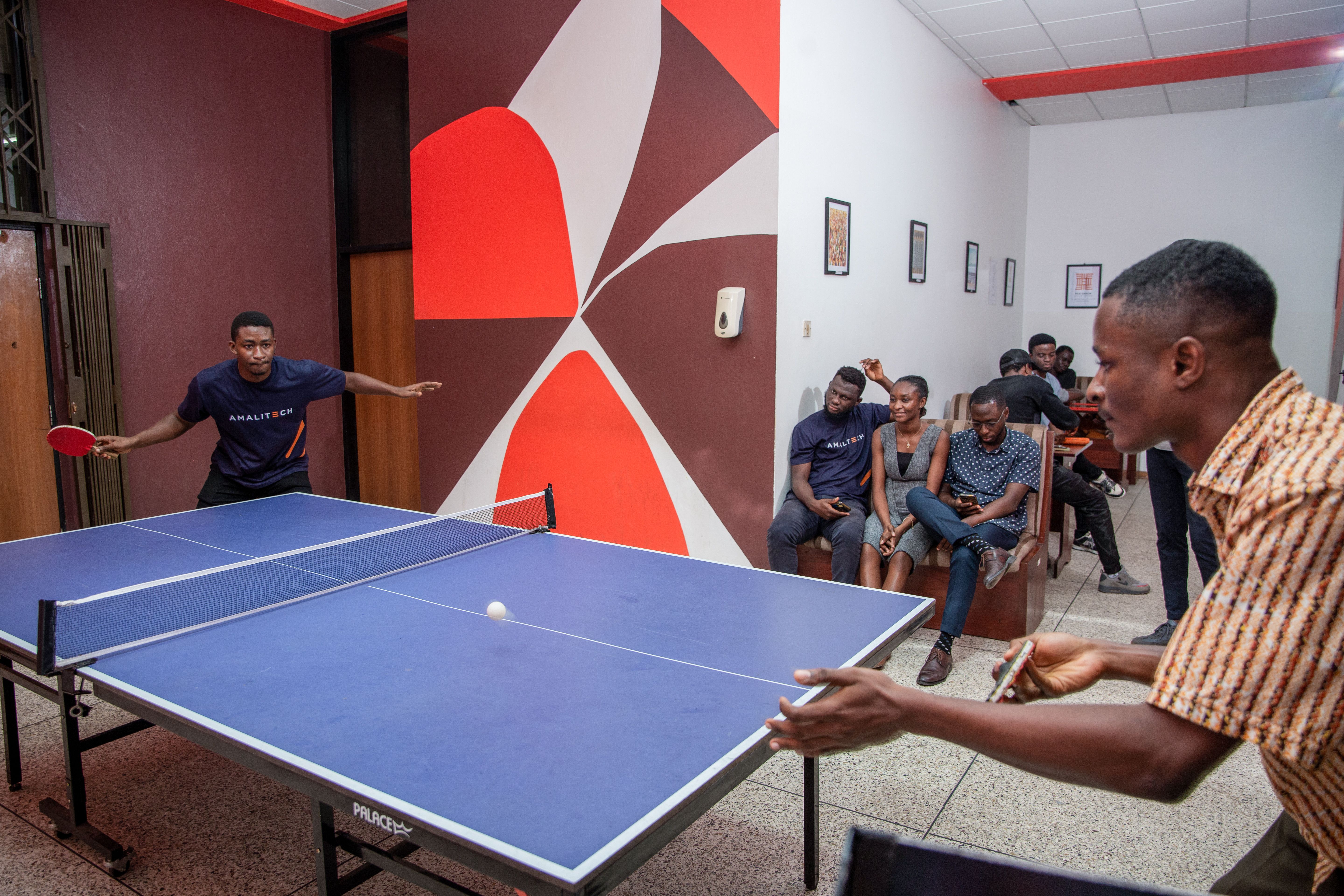 Young people playing table tennis