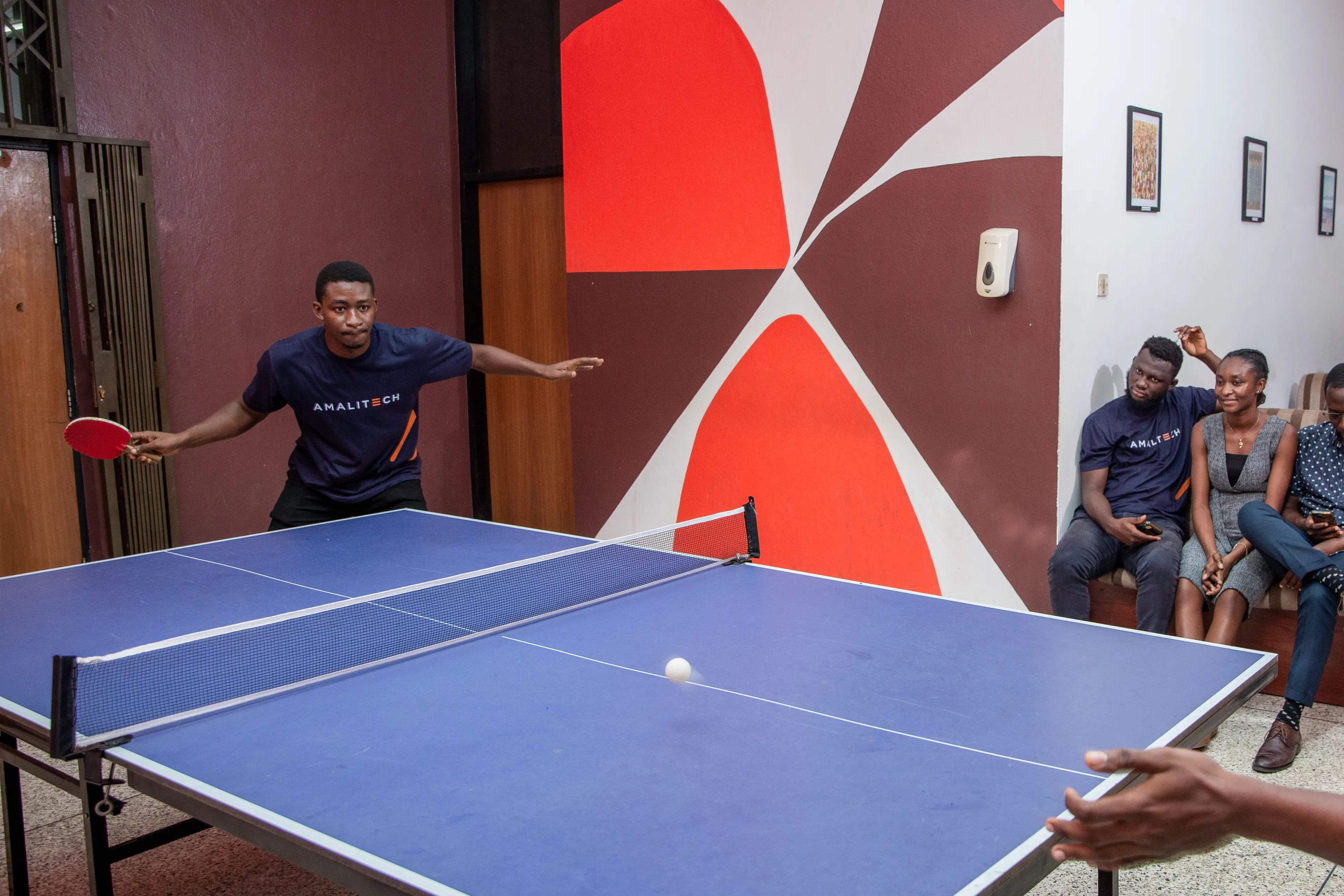 Young people playing table tennis