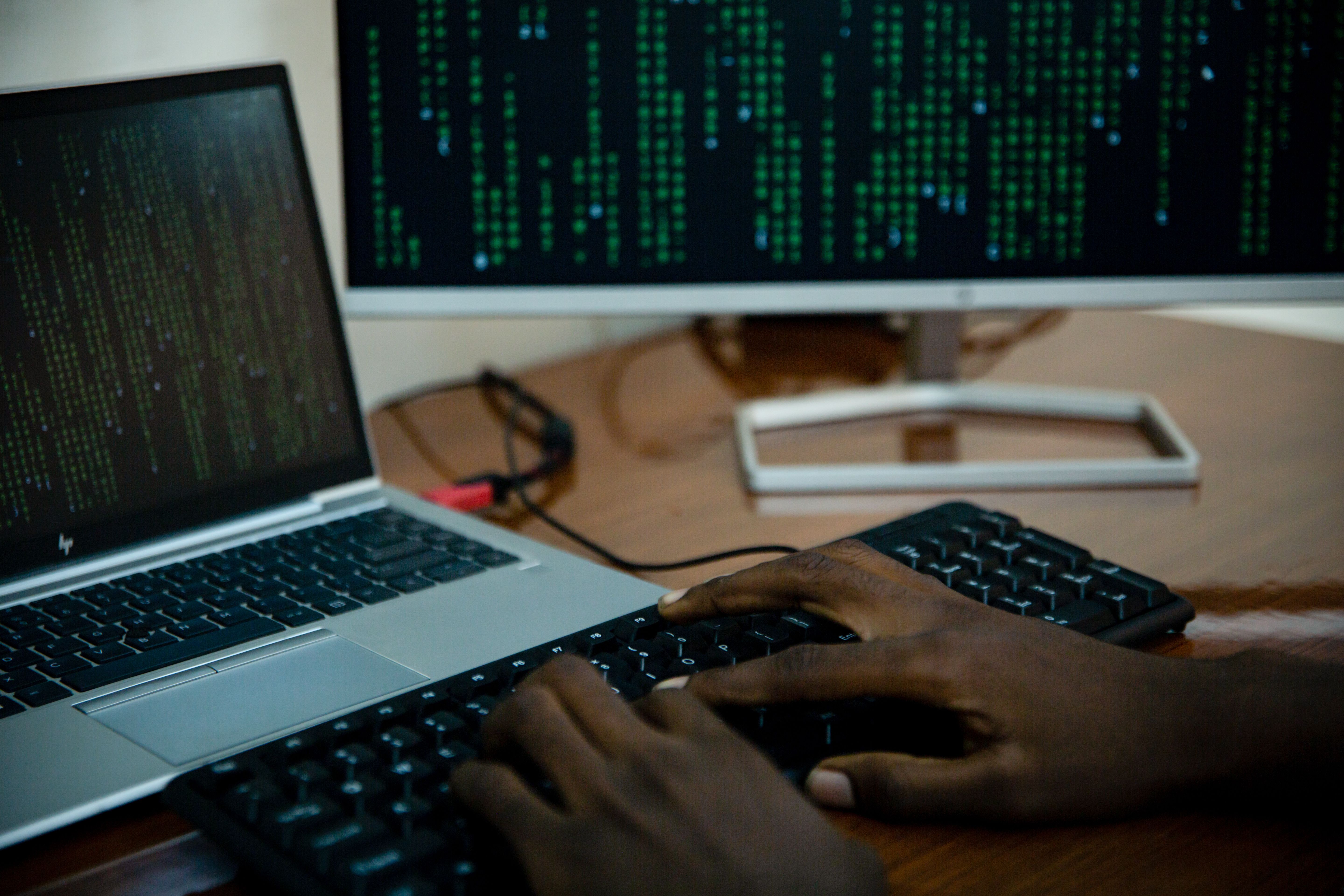 A close up picture of a computer with code.