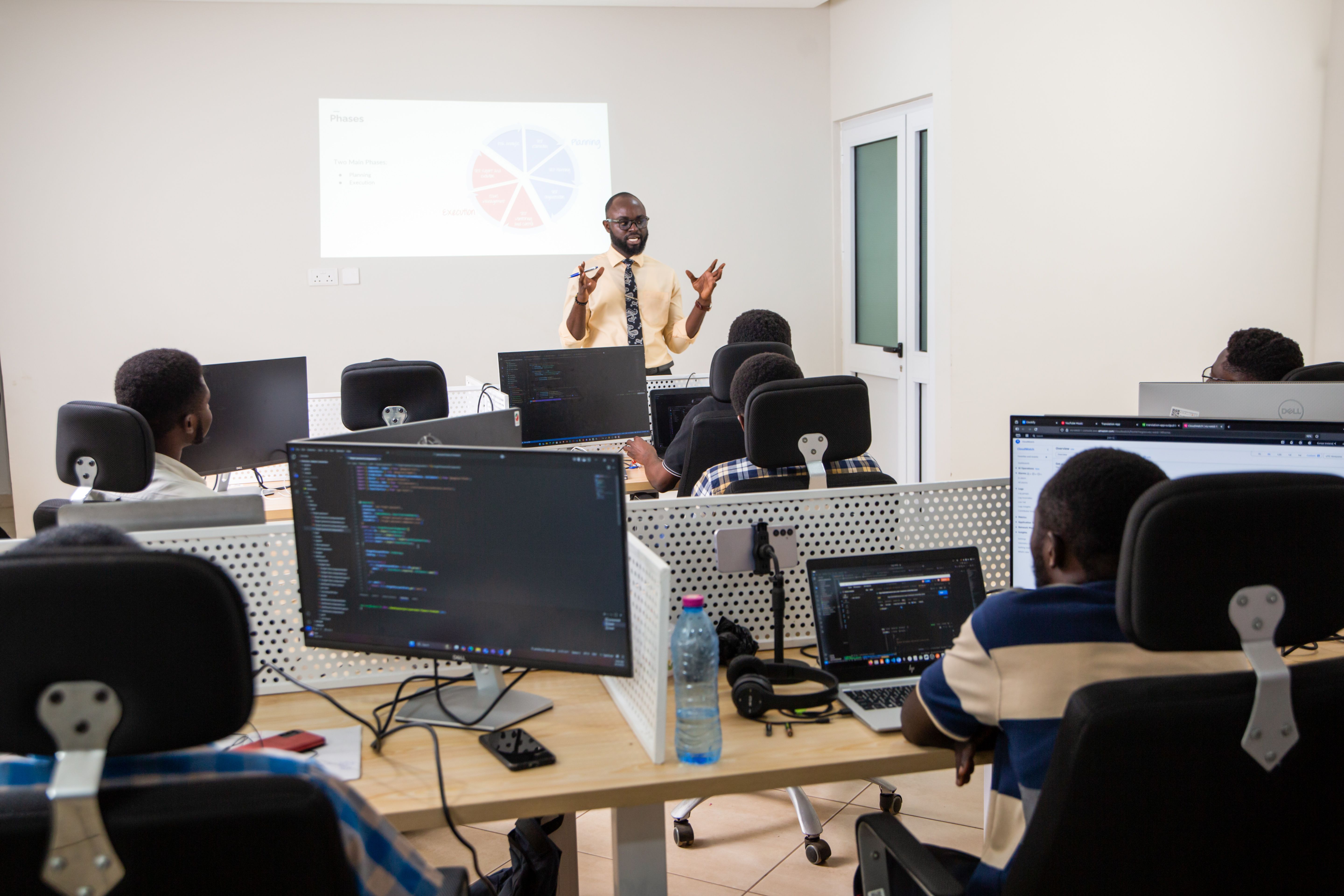 a young tutor leading a training section