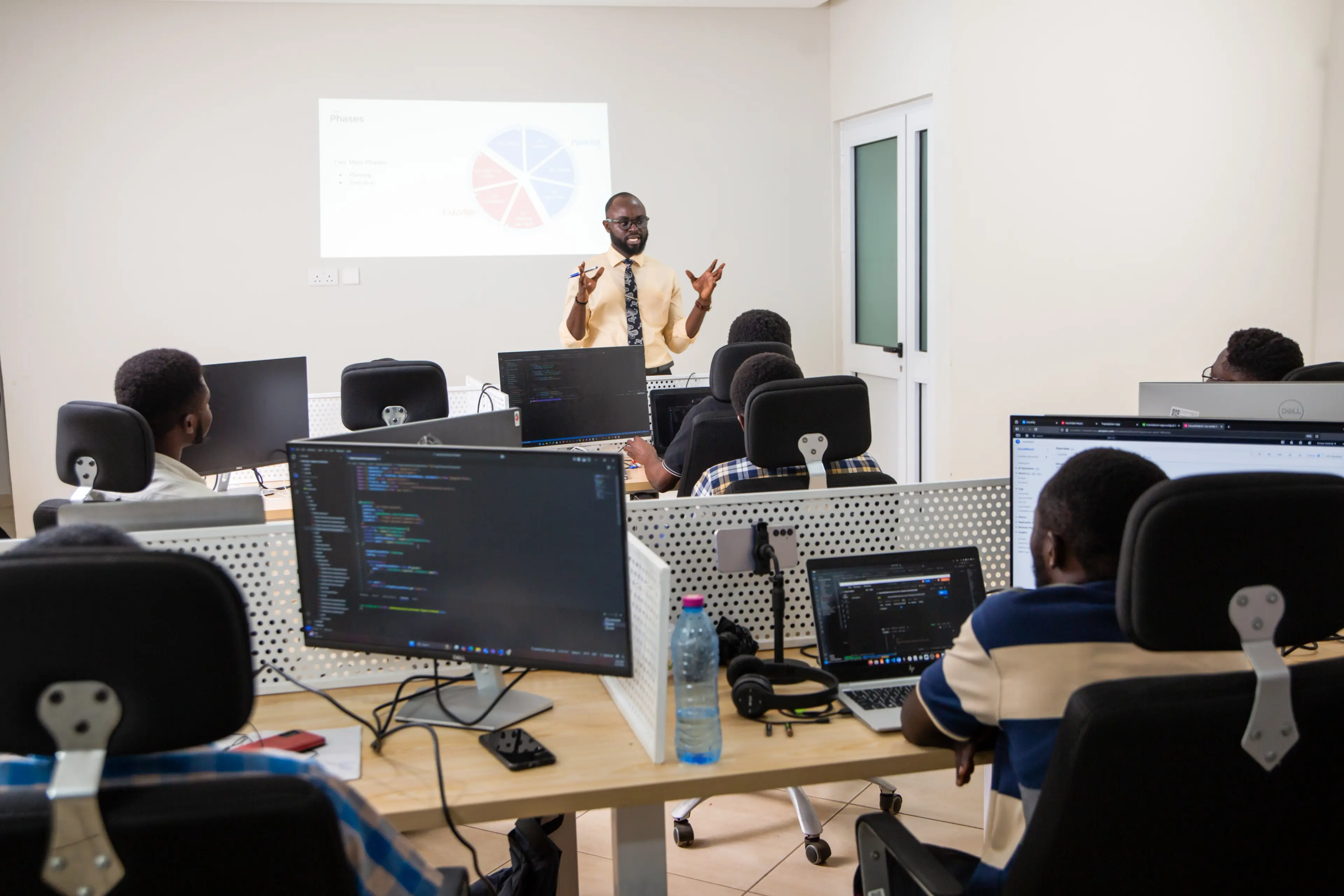 a young tutor leading a training section