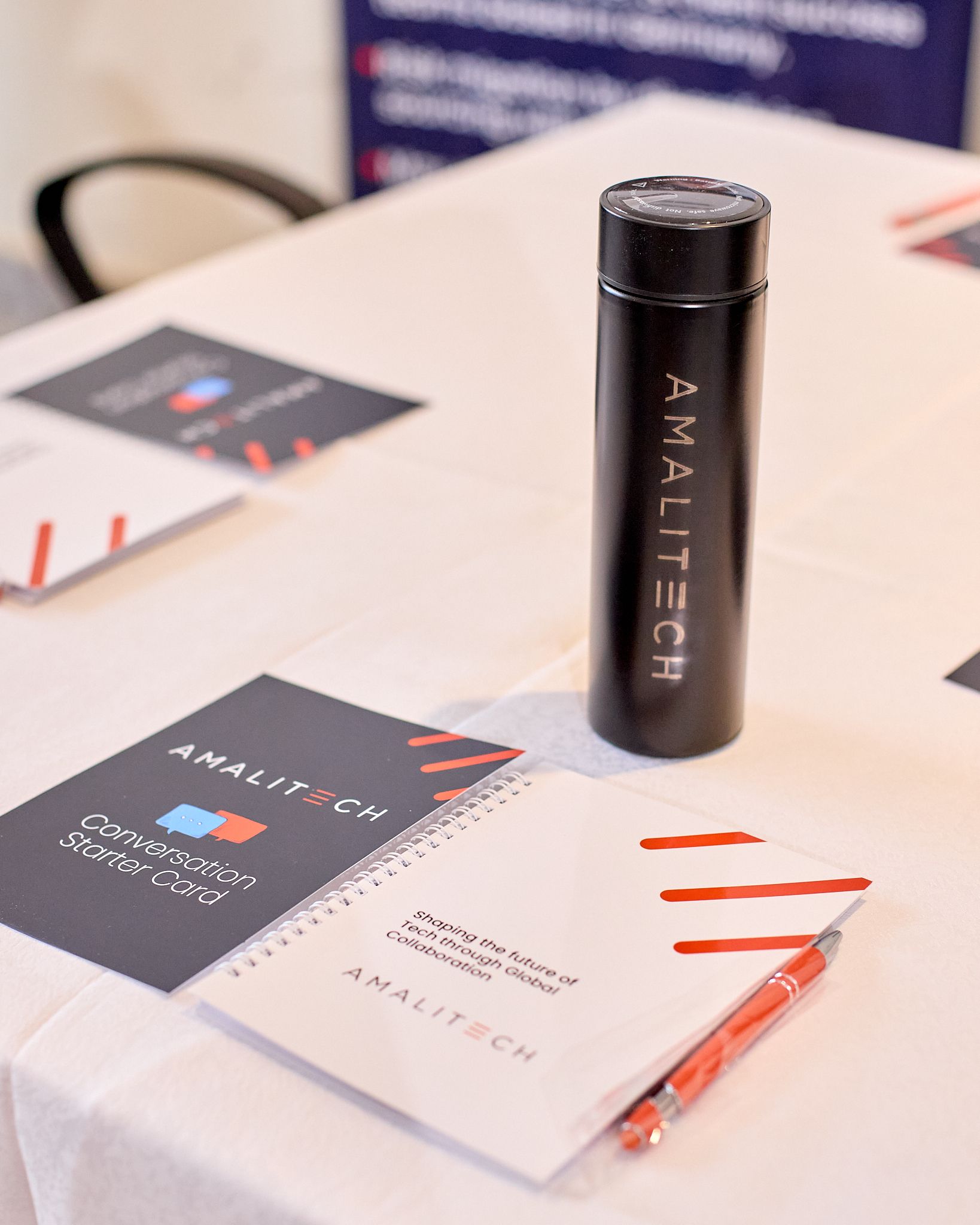 AmaliTech branded souvenirs on a table