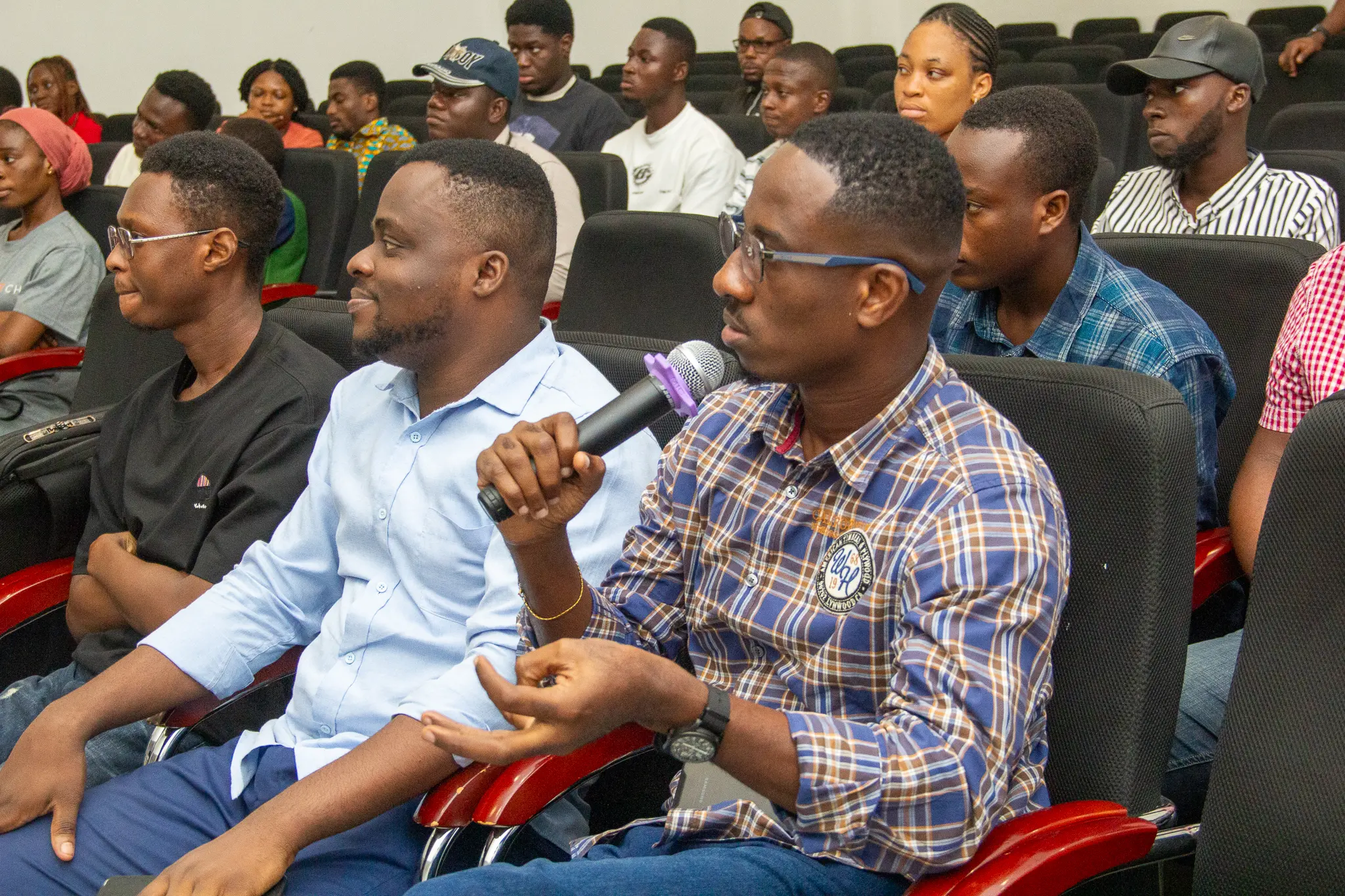 the judges offering feedback to the hackathon groups