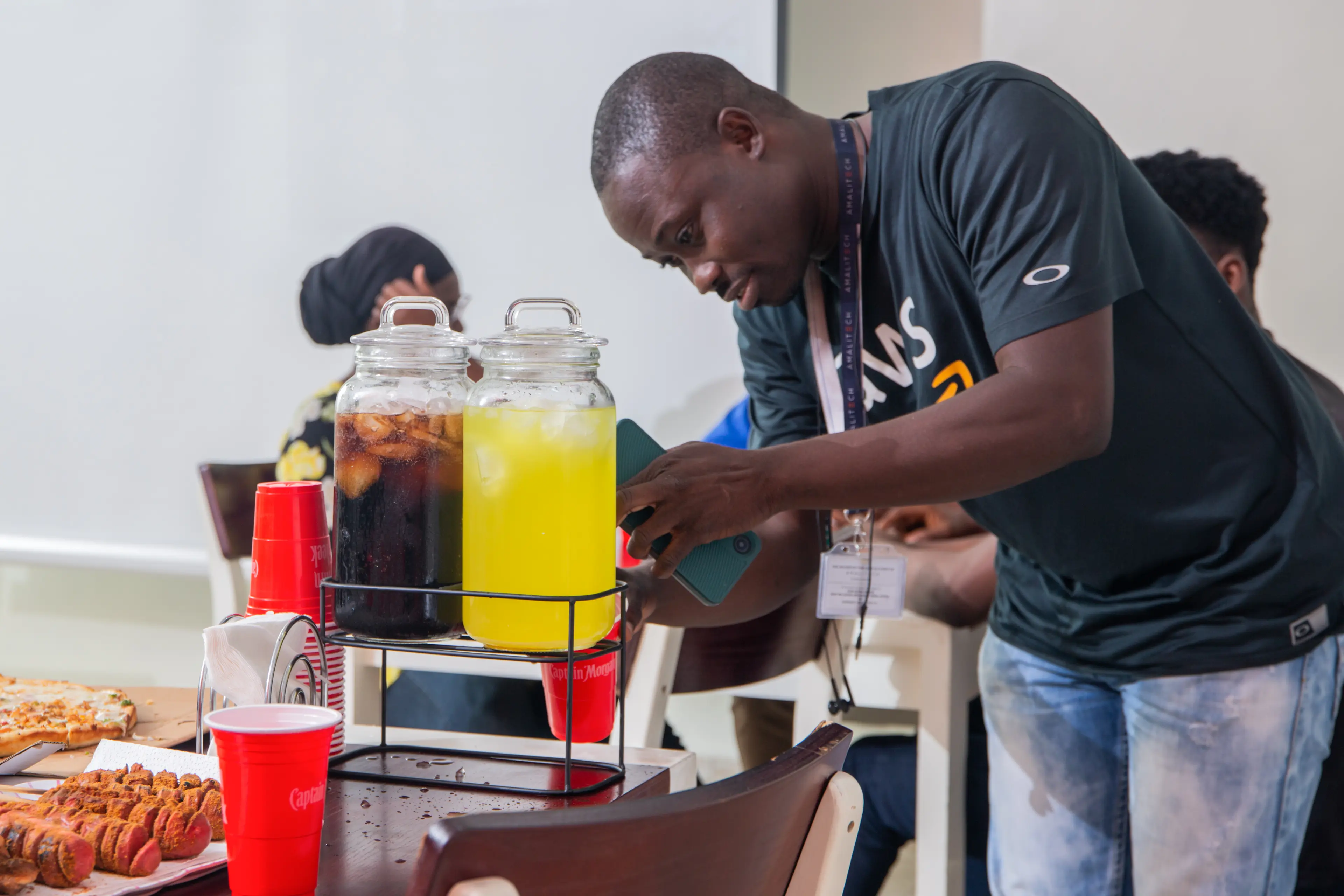 a young man fetching juice
