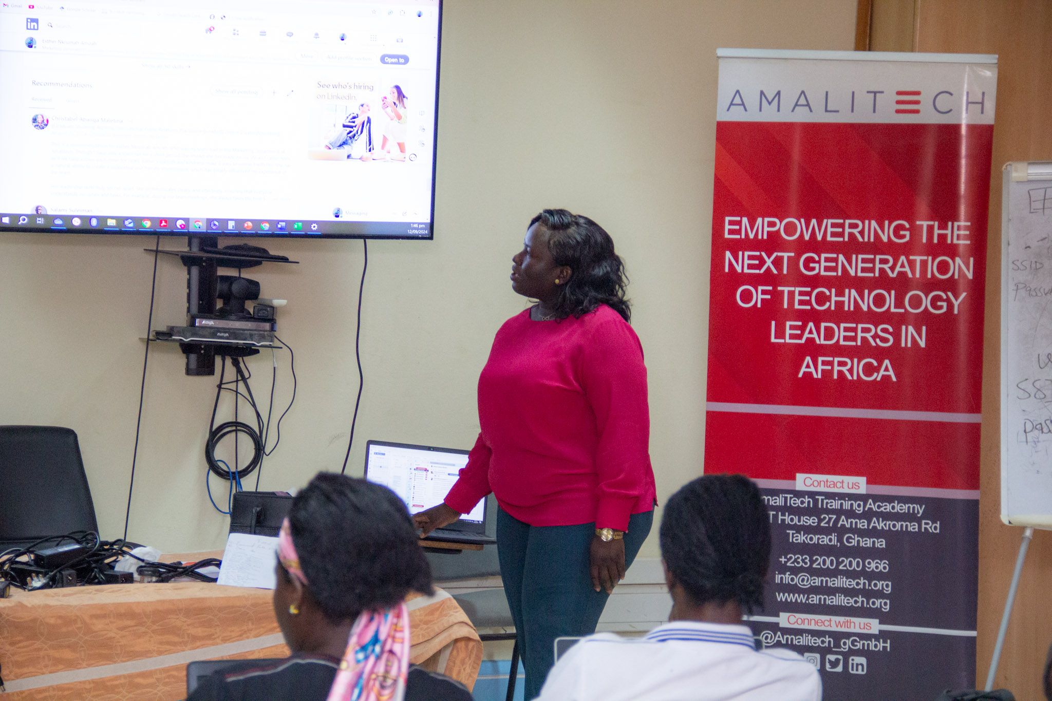 a lady doing a presentation to young people