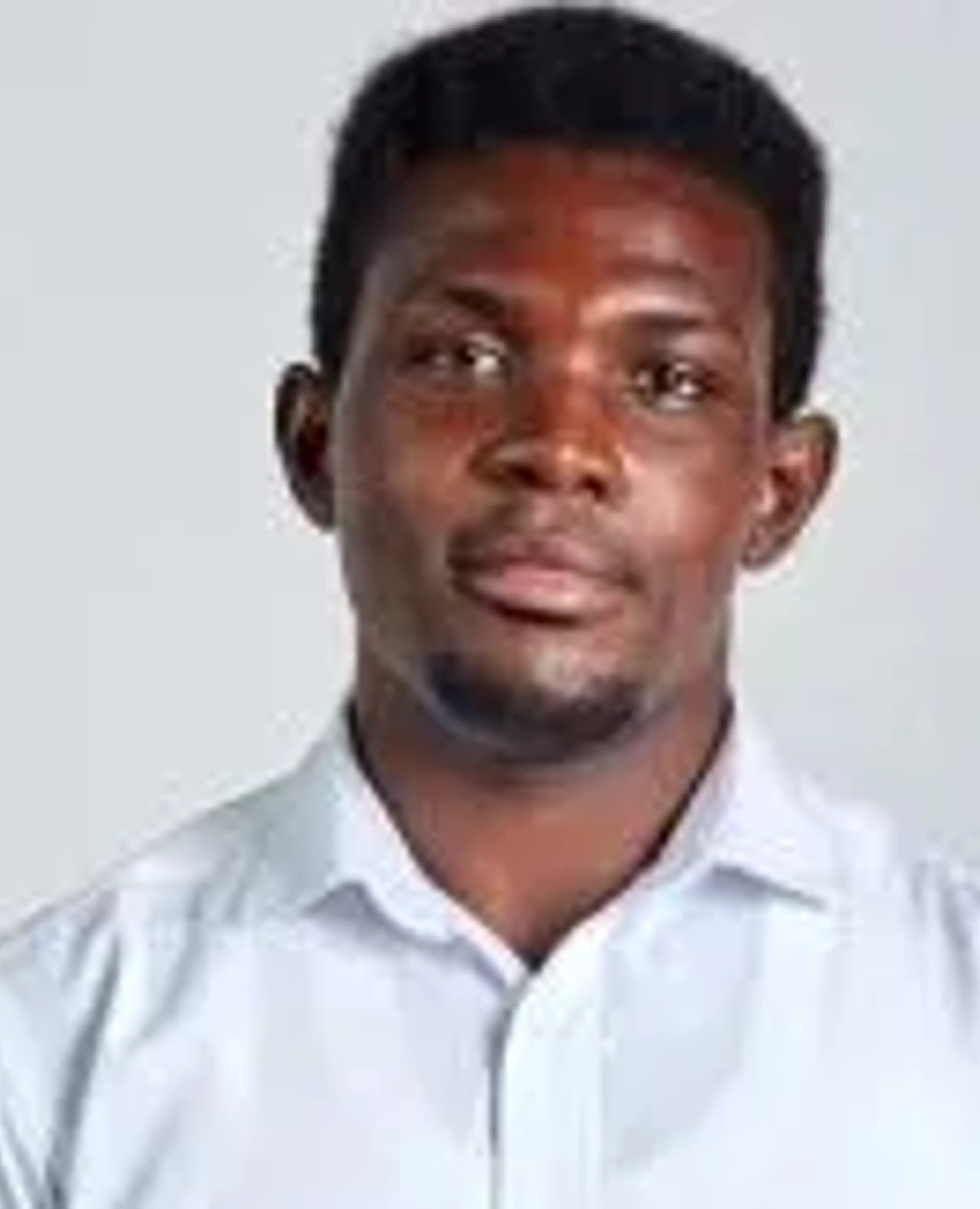Nathaniel Cobbinah smiling at the camera
