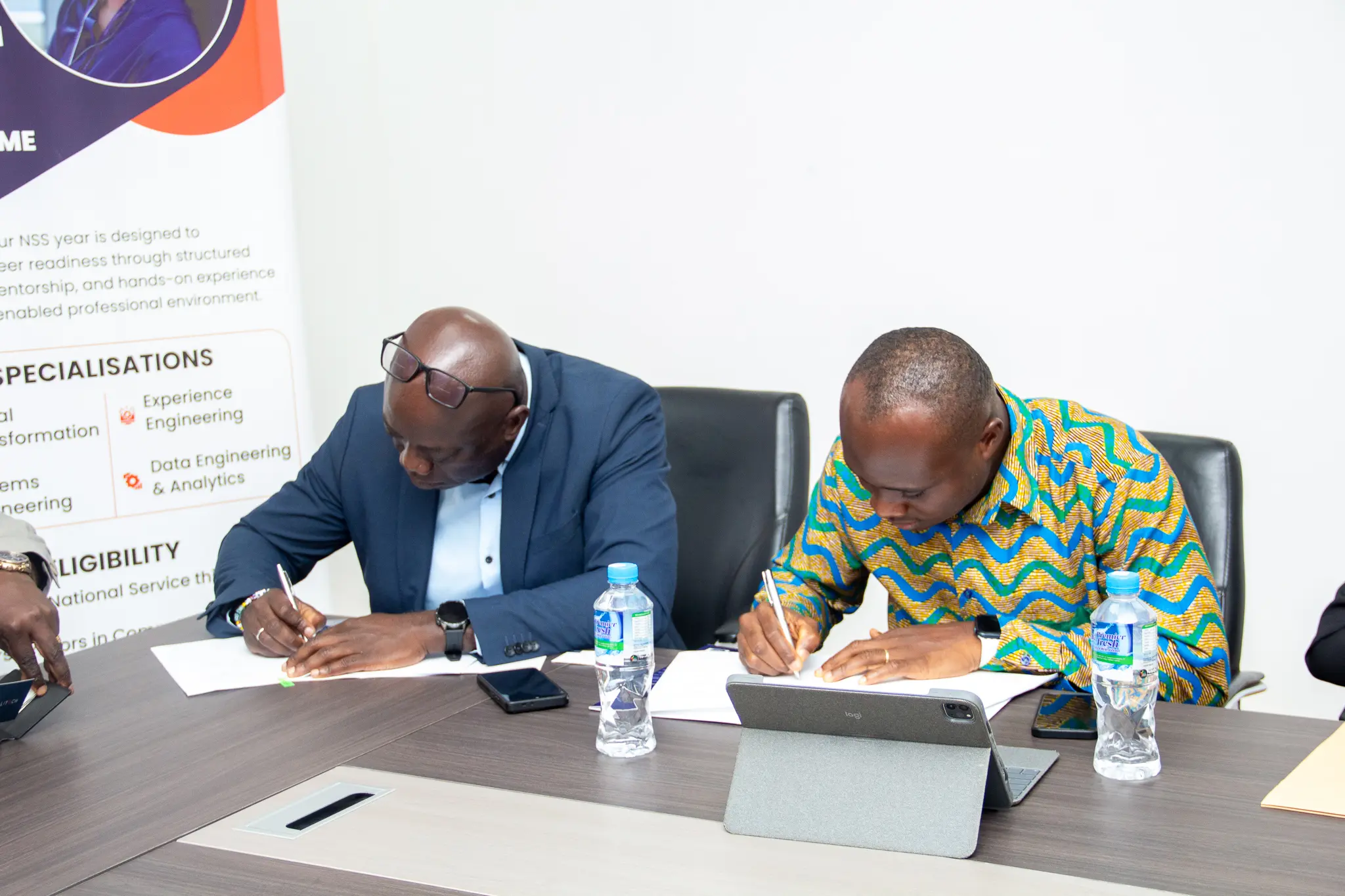 AmaliTech VP, and Head of Recruitment signing a document