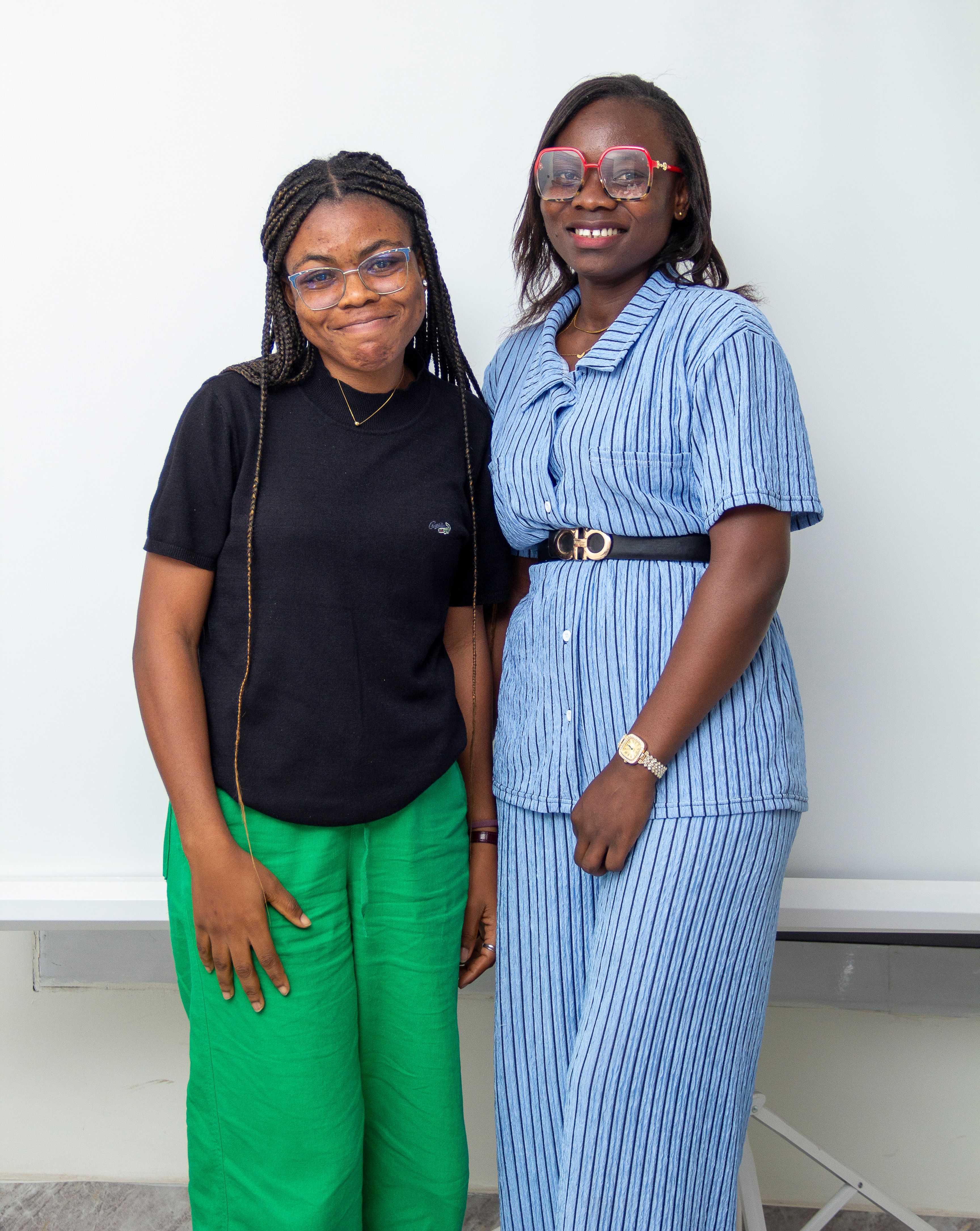 Two women smiling at the camera