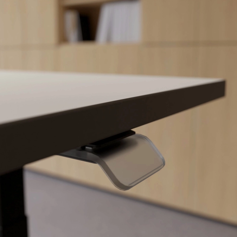 Detailaufnahme des nahezu transparenten Kunststoffhebels zur Höhenverstellung eines 25-table Q.