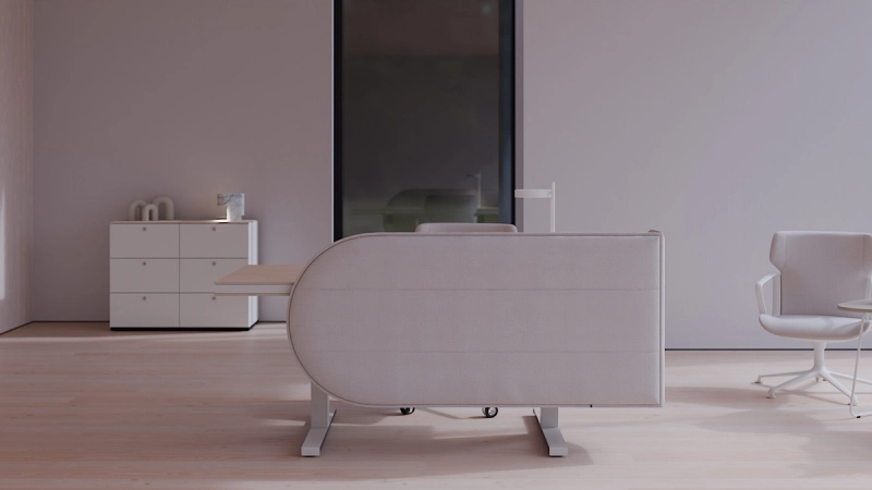 Rückseite eines 848-screen an einem Einzelarbeitsplatz, daneben ein Sideboard und ein Besucherstuhl.