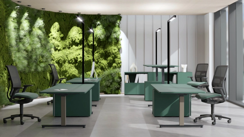 Mehrere 25-table R mit Platte in irischgrün, kaschmirfarbener Säule und schwarzem Ausleger, dazu passende Container in derselben Farbe.