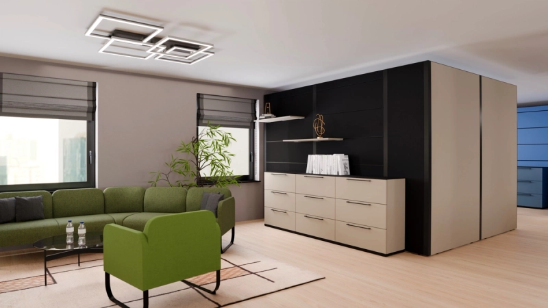Multiwa-Wand in schwarz mit zwei eingehängten Regalböden über einem Sideboard, davor eine Lounge-Sitzgruppe