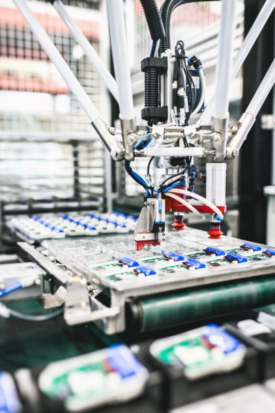 Robotic arm in electronics manufacturing