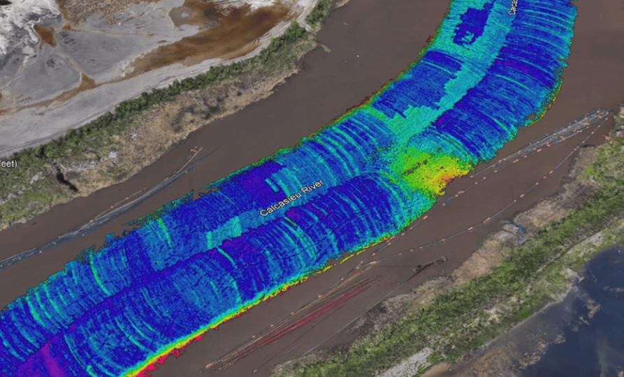 Low-frequency band LMD surface over the same reach showing remnants of cutter-suction dredging and a point of localised consolidation detected through the fluid mud layer.