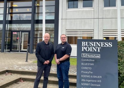 Peter Eriksen, CEO, NORBIT Oceans, visits the new office, here seen outside with Uni Bull.
