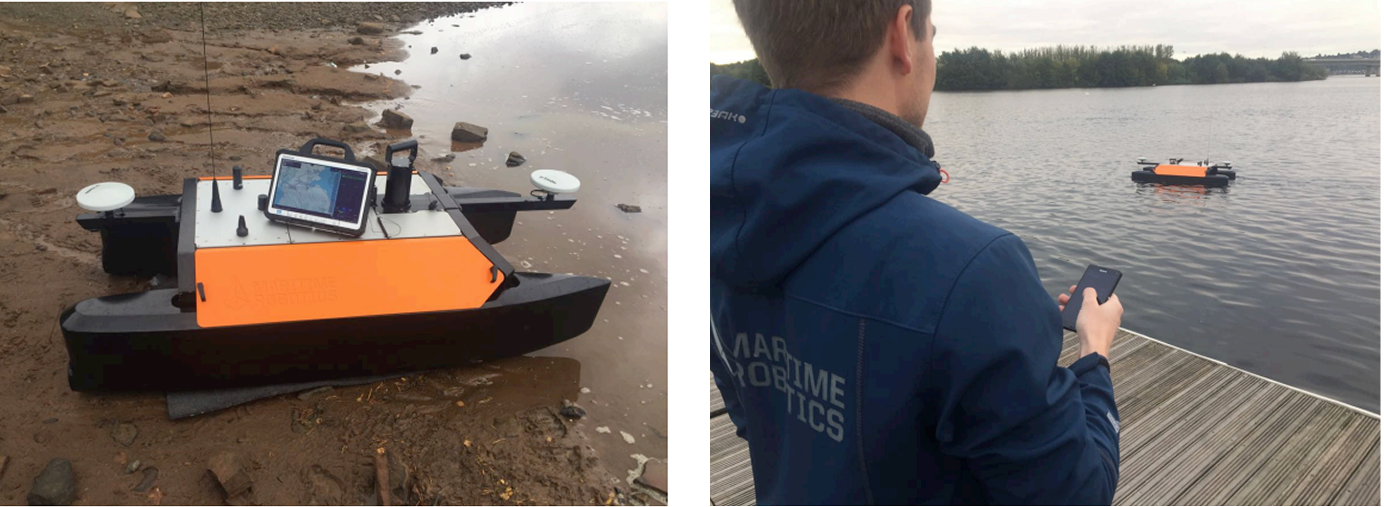 Maritime robotics Otter USV being steered by a man.