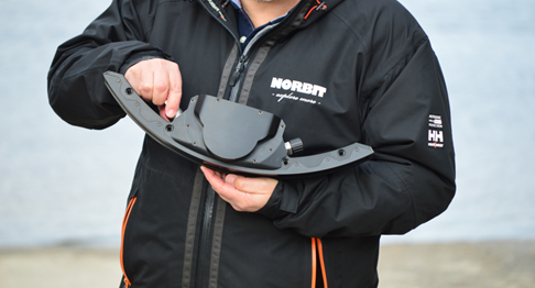 Person holding the WINGHEAD F11 in his hands.