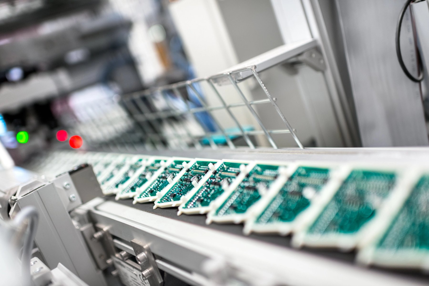 Circuit boards on electronics manufacturing production line