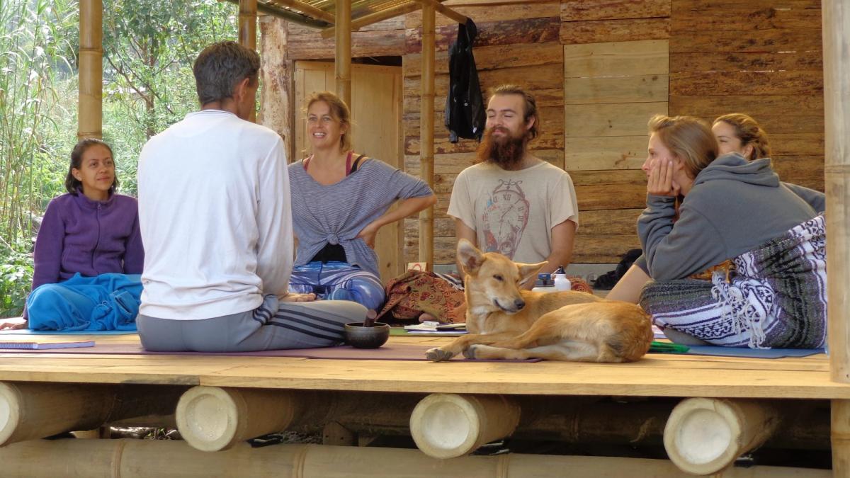 People seated together in a quiet circle.