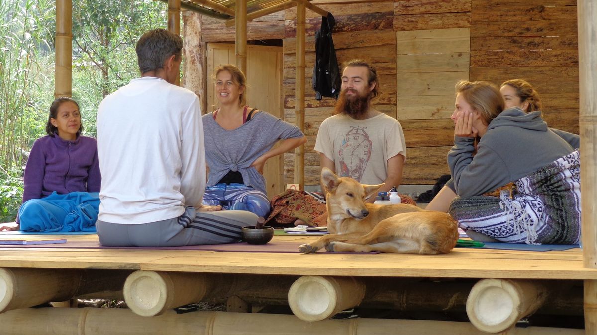 People seated together in a quiet circle.