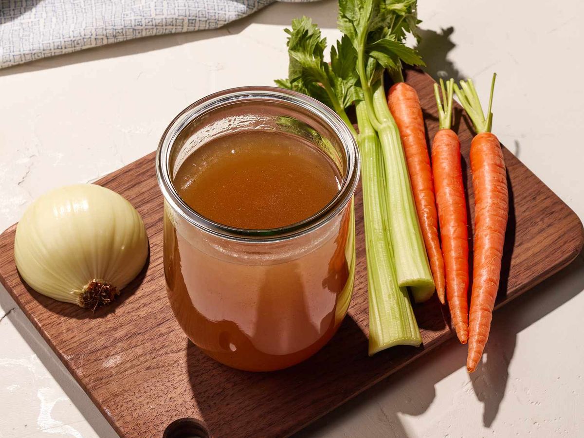 Vegetable broth with carrots, celery, and onion.