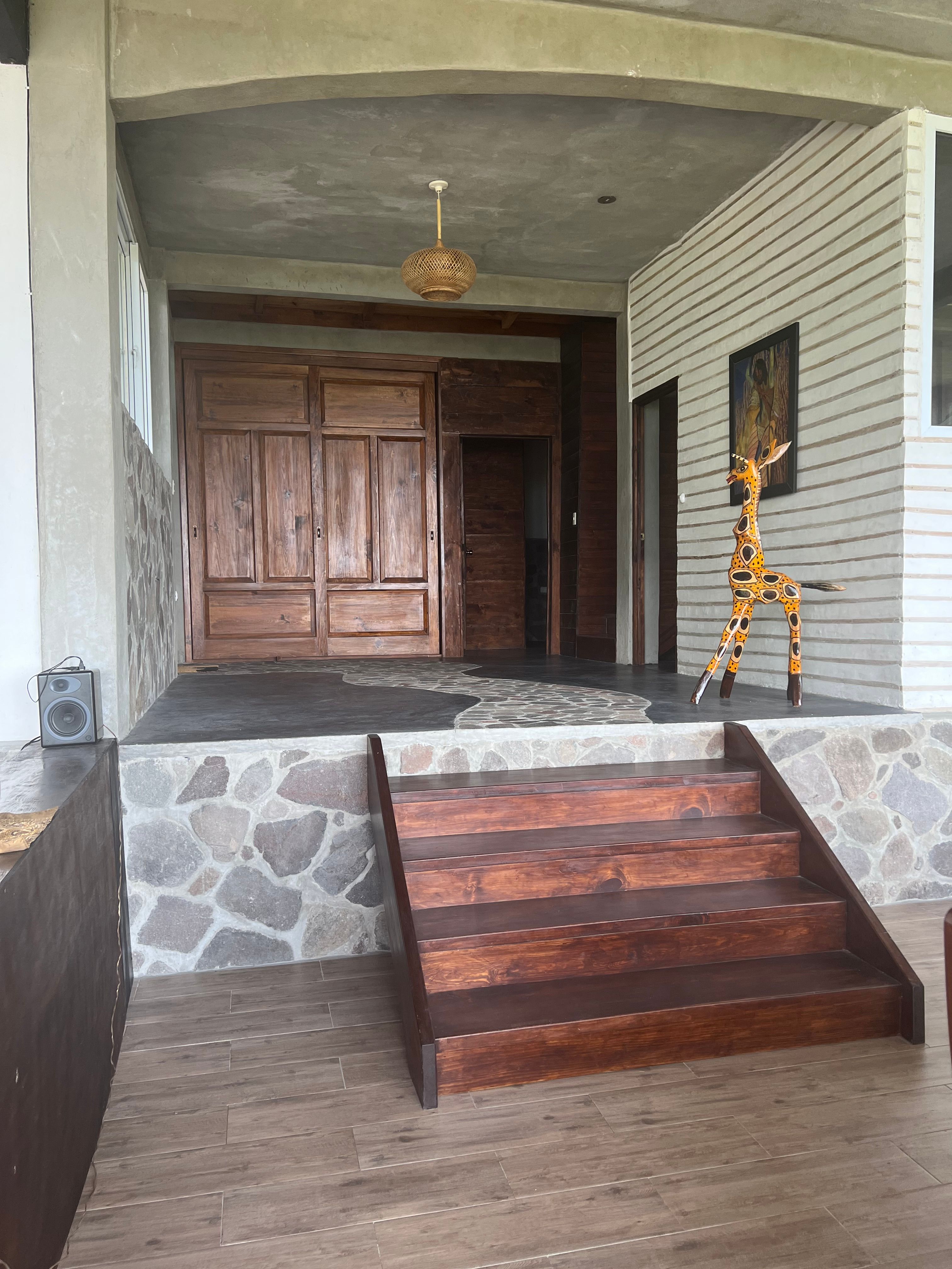 All work is artesanal, real wood, stone and Natural building mixed with concrete.