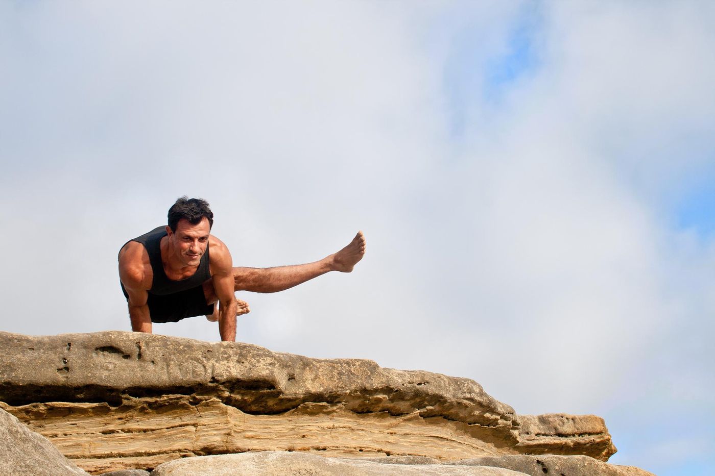 Jump through from downward dog to sitting in Ashtanga
