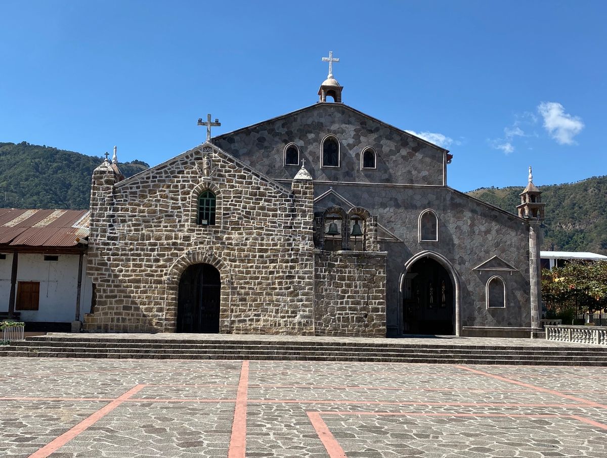 A stone church in a mountain town.