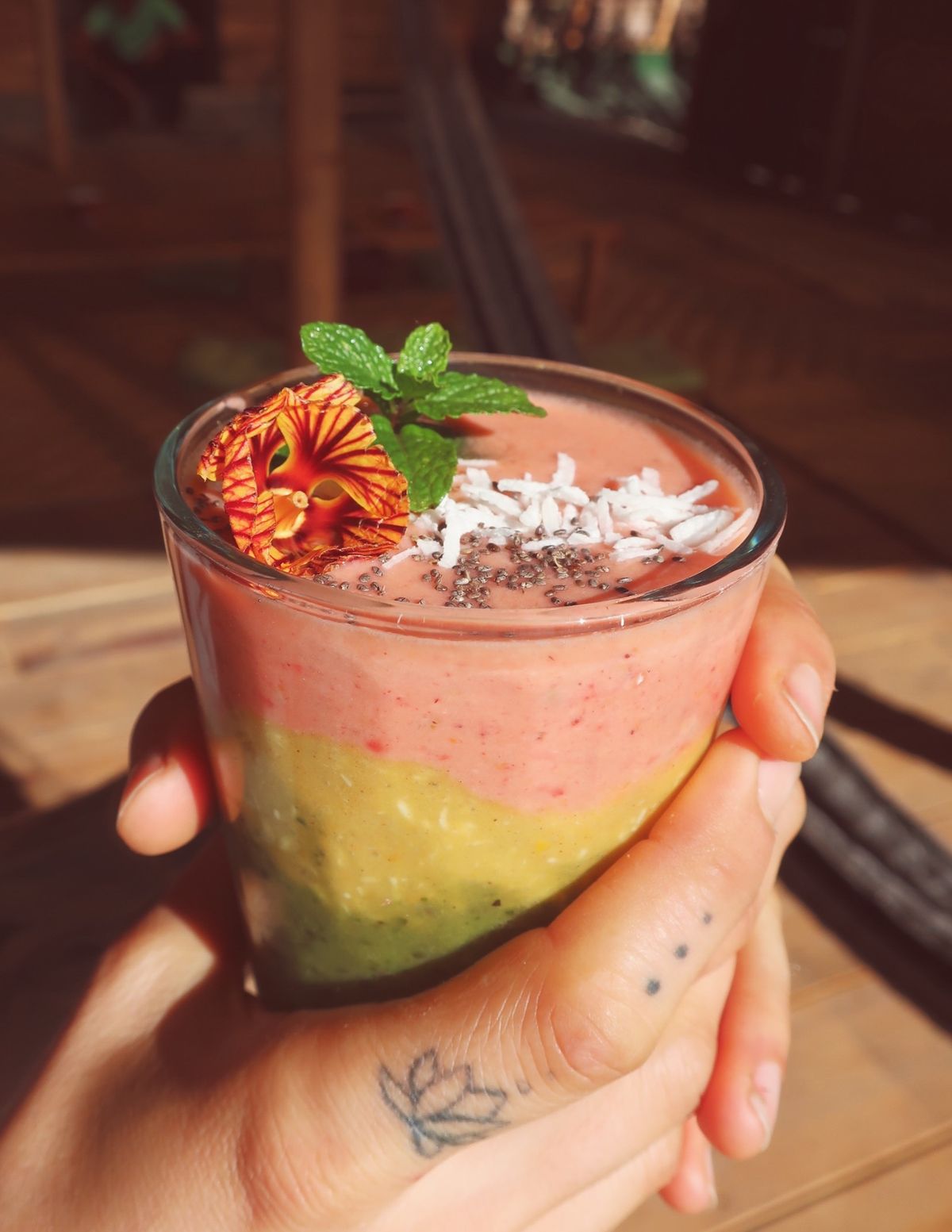 A layered fruit smoothie.