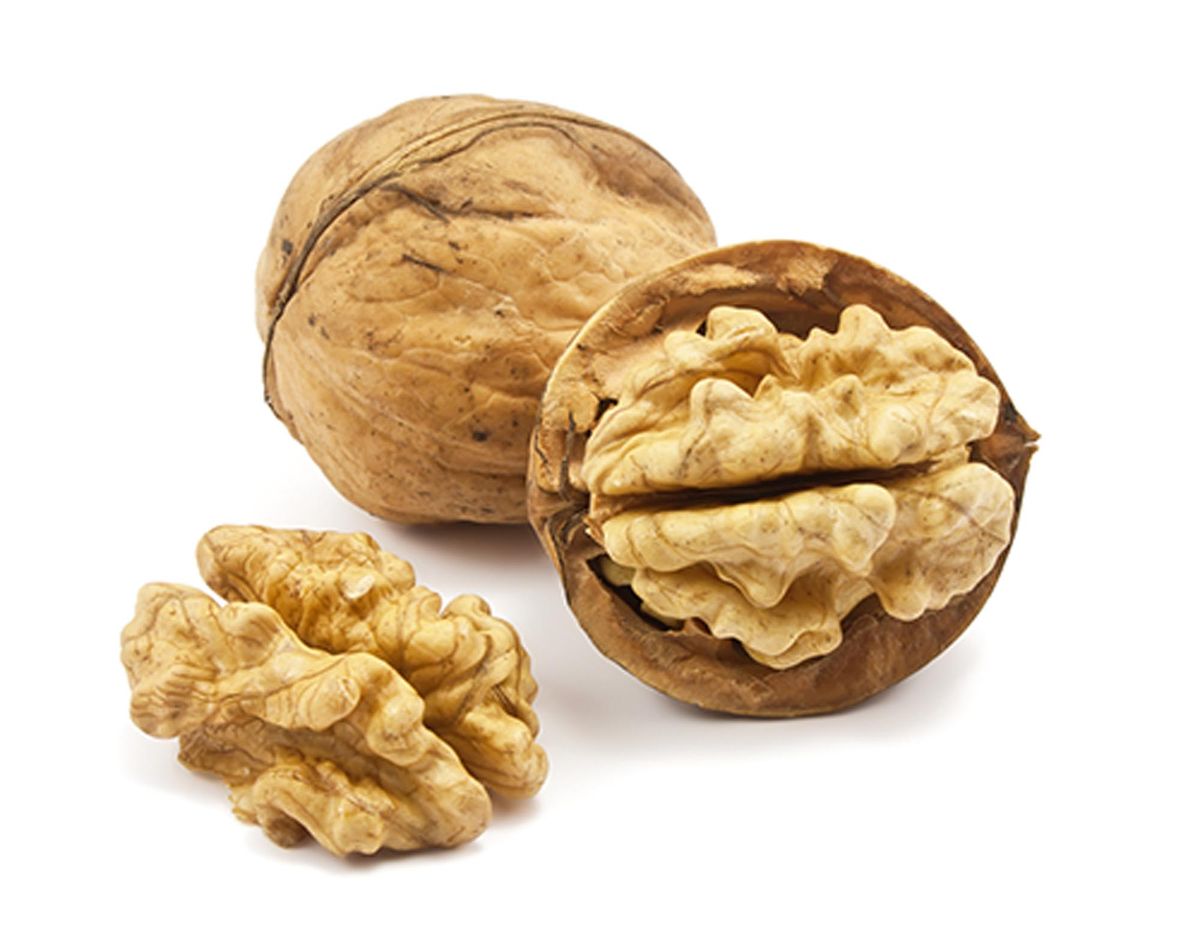 Walnuts in their shells.
